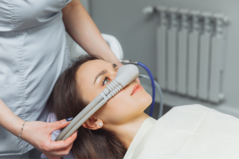 a lady is getting sedation dentistry treatment