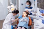 kid getting dental treatment to avoid cavities