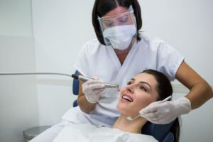 a women is getting dental treatment